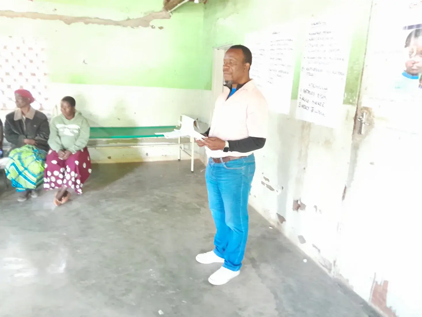 A facilitator leading an adult community health and wellbeing learning session