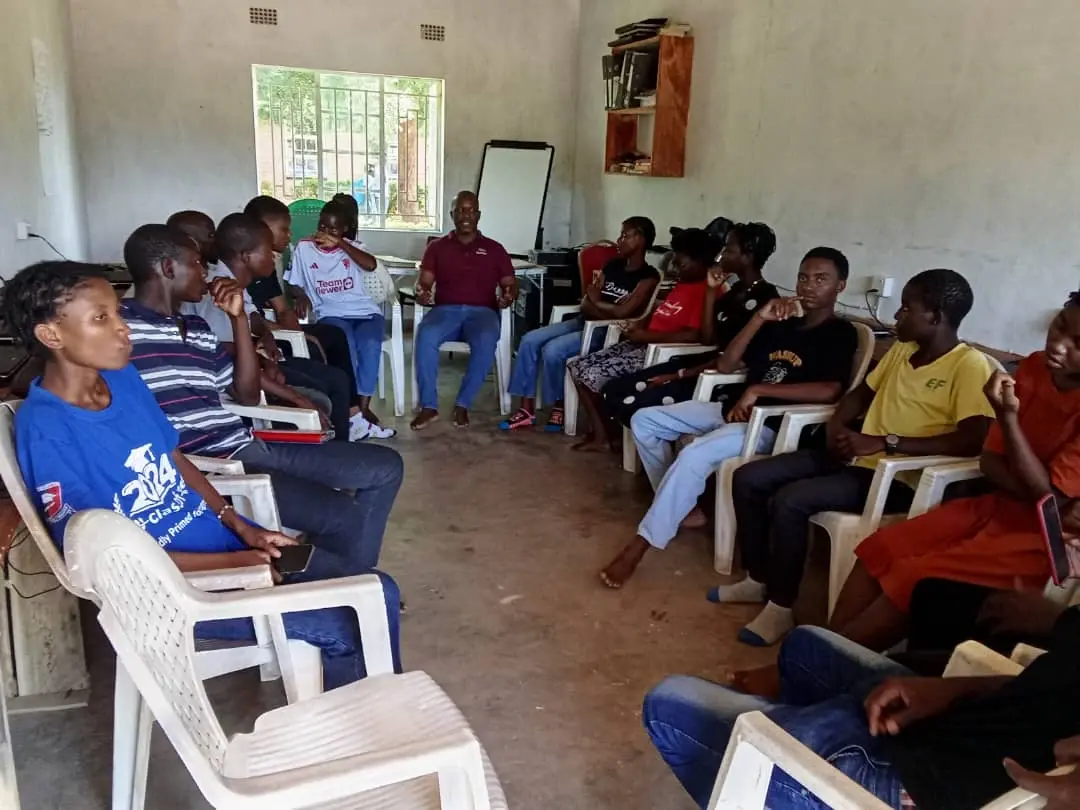 SURCOD participants and facilitators holding a structured planning and learning session indoors
