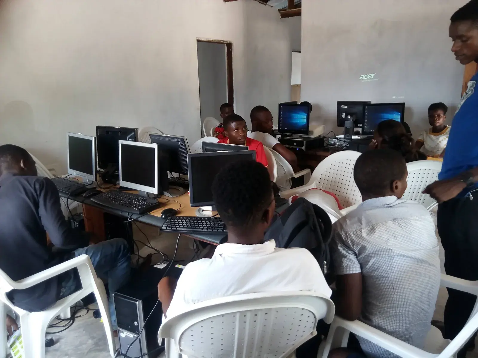 Participants taking part in a practical computer learning session