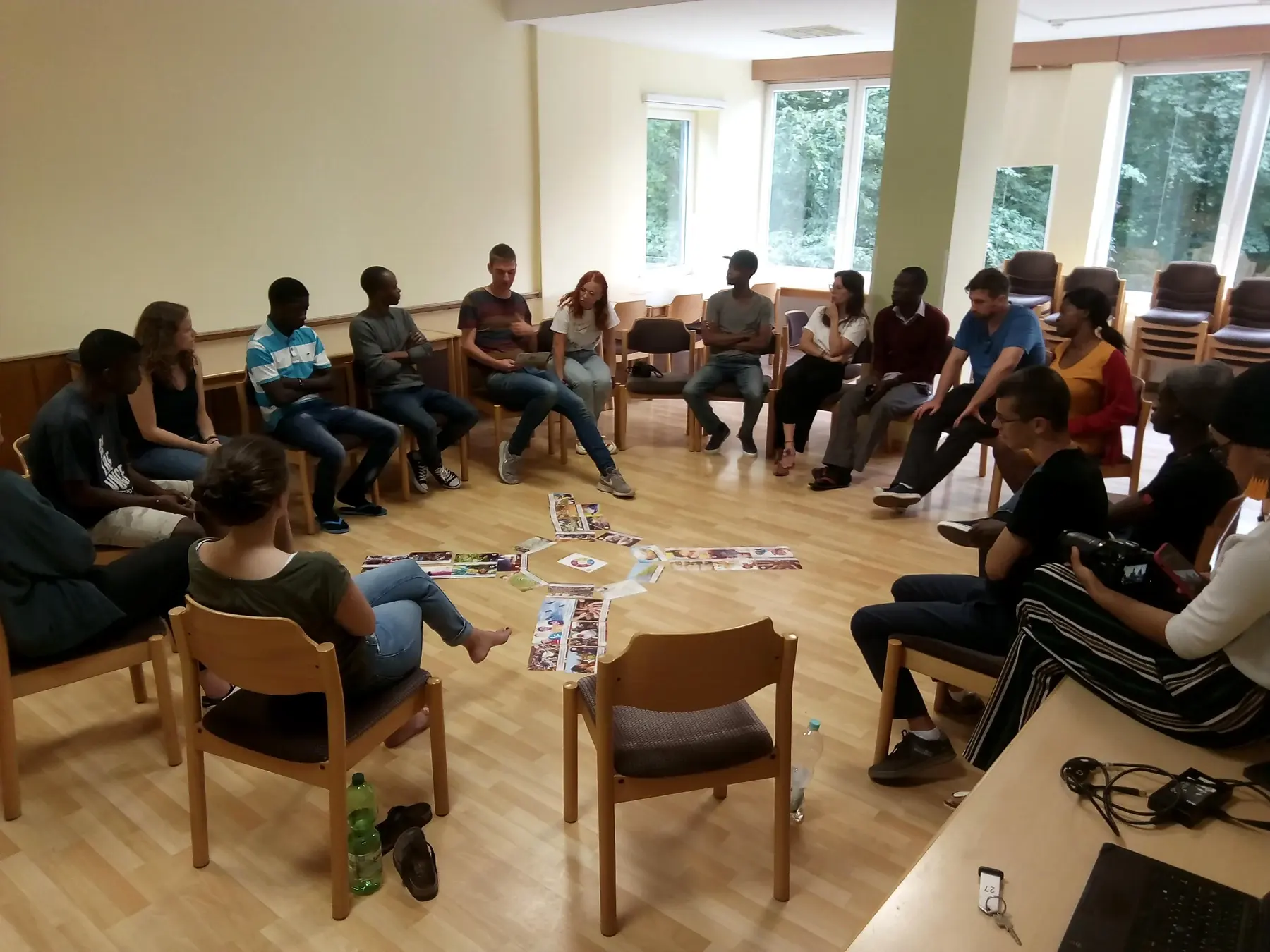 Young adults from different backgrounds participating in a collaborative learning workshop