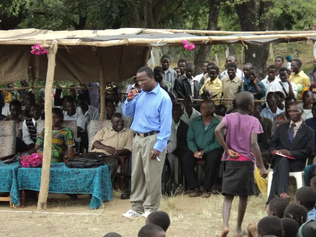 SURCOD Executive Director addressing community members during the launch of the Chididi savings project
